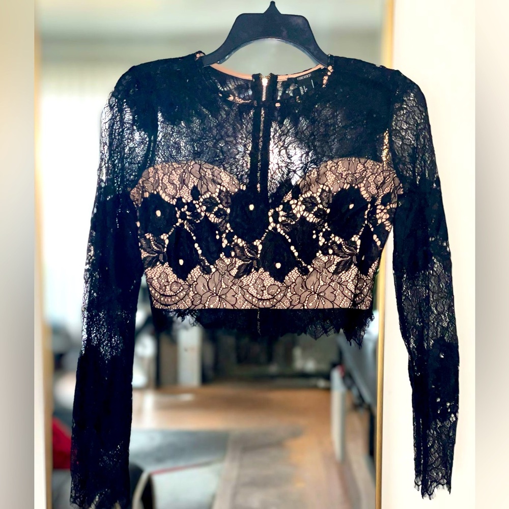 Black lace long sleeve crop top w/ nude built in cami 
Brand: Forever 21
Size: S